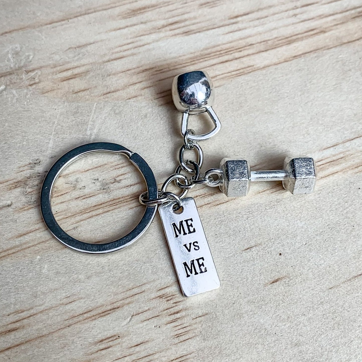 motivational keychain, me vs. me, barbell keychain