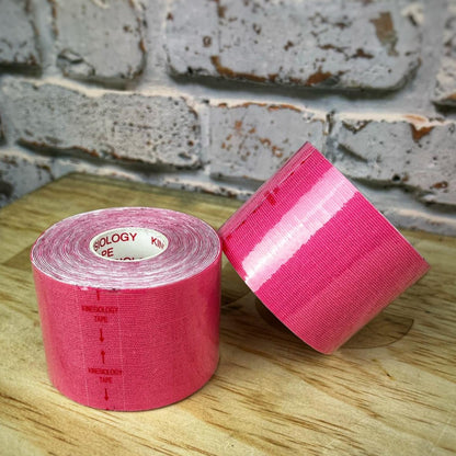 Pink kinesiology tape